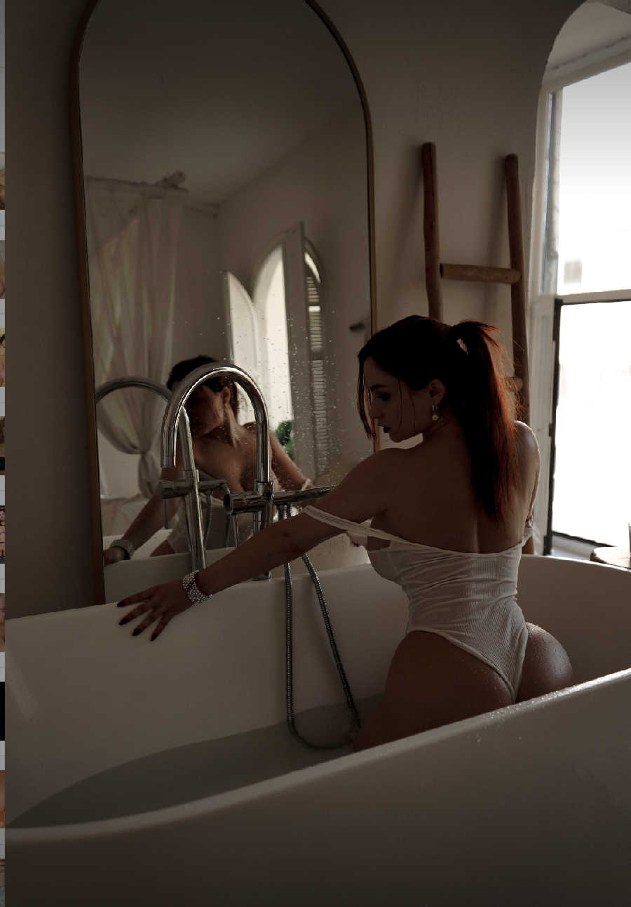 A playful frame from Miranda Faith nude — online in Winnipeg